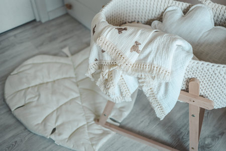 Muslin blanket on the cradle in the children's room.の写真素材