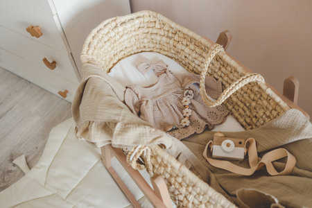 Outfit for a newborn in a baby cradle, concept in anticipation.