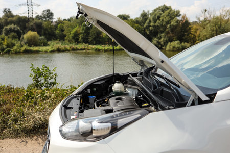 Open car hood.
