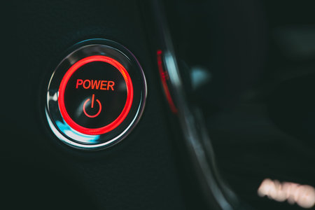 Power button close-up, background.