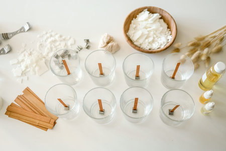 Tools for making candles in a workshop.