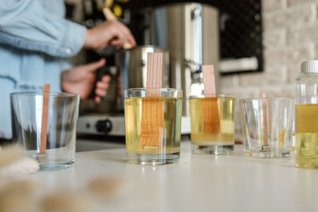 Process of making candles in a workshop.