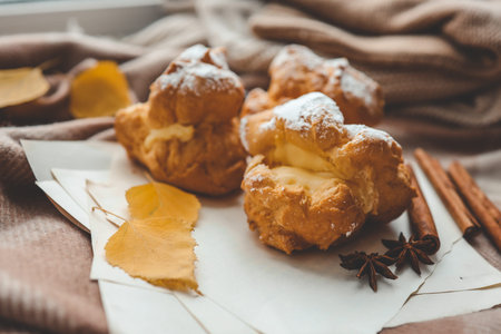 Freshly baked choux pastries close up.