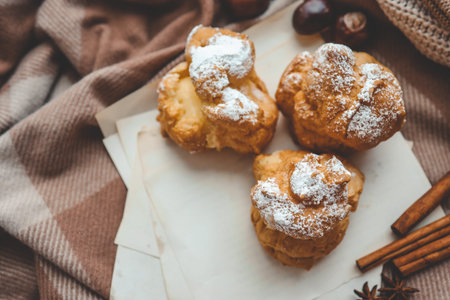 Freshly baked choux pastries close up.