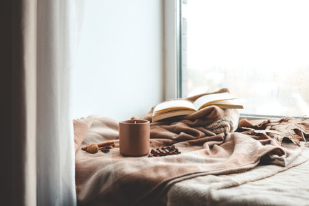 Autumn composition on the windowsill in a home interior.の写真素材