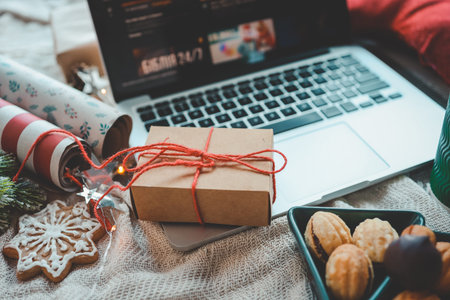Christmas gift box on laptop.