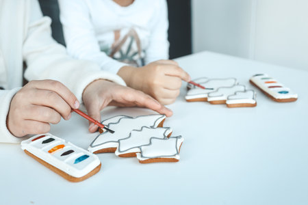 Children coloring gingerbread, creative idea.の写真素材
