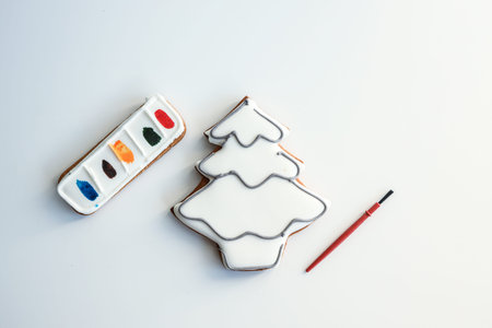 Gingerbread in the shape of a Christmas tree for coloring yourself, an idea for creativity with children.の写真素材