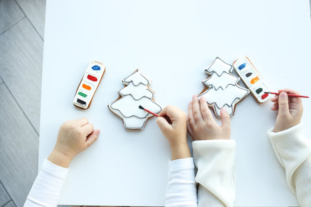 Children coloring gingerbread, creative idea.の写真素材