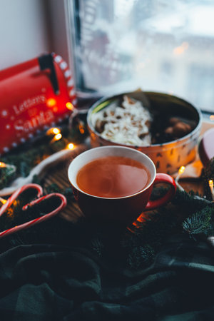 A cup of tea in a Christmas atmosphere, mood.