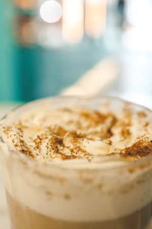 Latte on the table in a cozy cafe, food photo.