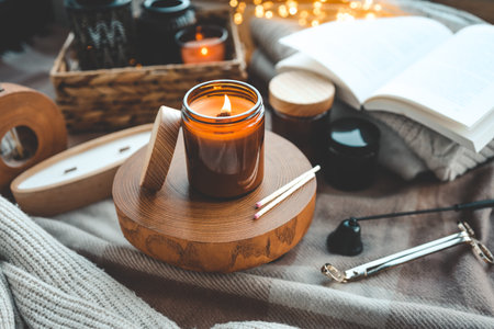 Burning candle in a festive cozy interior.の写真素材