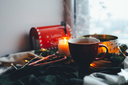 A cup of tea in a Christmas atmosphere, mood.の写真素材