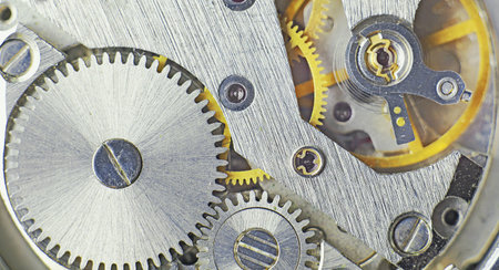 CLose up of cogwheels in a clock machine