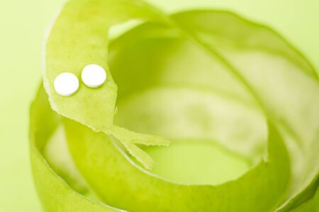 Peel snake out of apple peelの写真素材