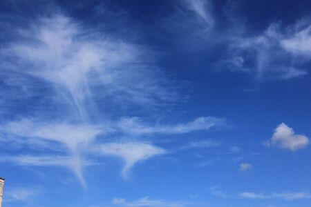 Blue sky with cloudsの写真素材