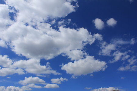 Blue sky with cloudsの写真素材