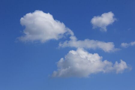 Blue sky with cloudsの写真素材