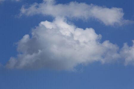Blue sky with cloudsの写真素材