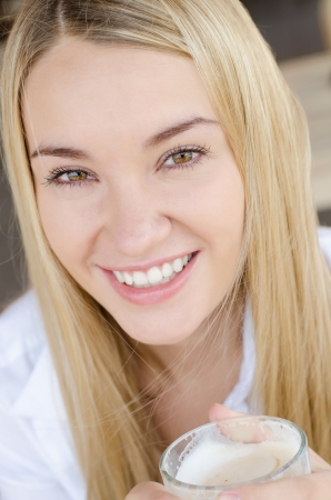 Beauty Girl With Cup of Coffeeの写真素材