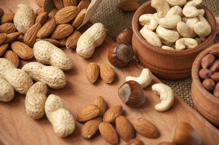 Different nuts. Almonds, peanuts, hazelnuts, cashewsの写真素材