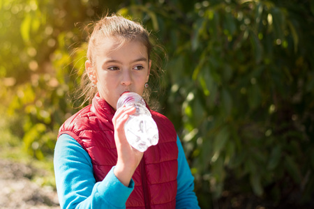 Girl drink waterの写真素材