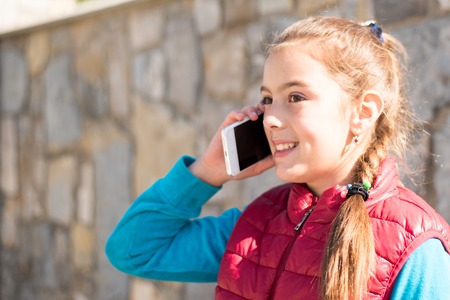 Girl with smartphoneの写真素材