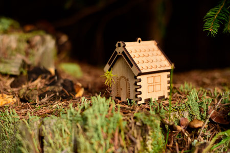 Wooden house model in the forest. conceptの写真素材