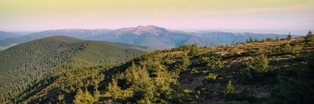 Panoramic view of idyllic mountain scenery in sunny dayの写真素材