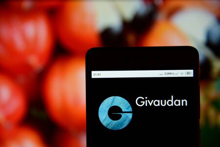 Givaudan logo seen on the smartphone screen .のeditorial素材