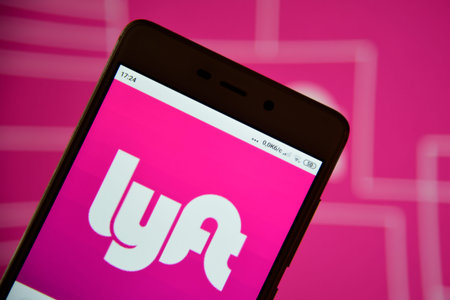 Lyft logo seen on the smartphone screen