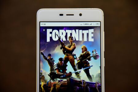 Fortnite game seen on the smartphone screenのeditorial素材