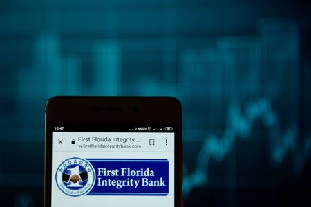 First Florida Integrity Bank logo on smartphoneのeditorial素材