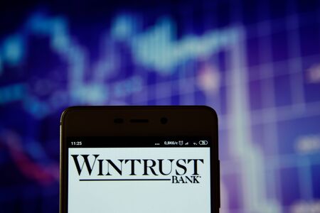 Wintrust bank logo is seen on smartphoneのeditorial素材
