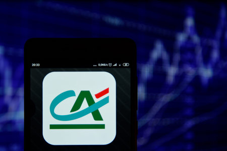 Credit Agricole logo on a smartphone display