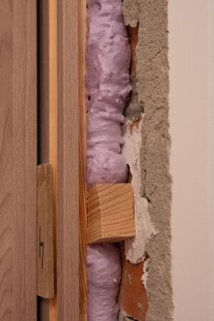 Installation of doors using polyurethane foam mountingの写真素材