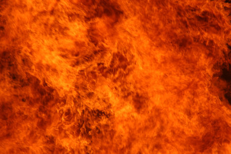 Red firey  taken at a bonfire for the local highschool