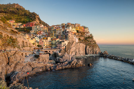 Beautiful panoramic of Manarola at the sunsetの写真素材