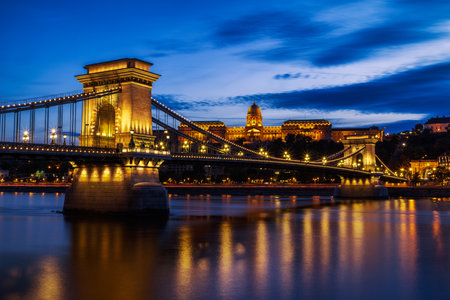 Chain Bridge in Budapest, Hungary at night with reflection in Danube riverの写真素材