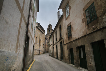 Narrow street among old buildingsの写真素材