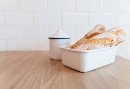 French bread and A jar with sunshine in morning, Beauty concept of beverage and food with relaxation and refreshment during day. Cafe shop.の写真素材