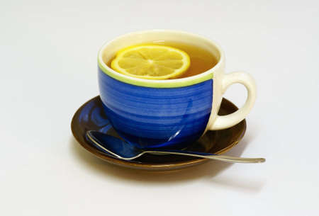 Cup of tea with lemon, white backgroundの写真素材