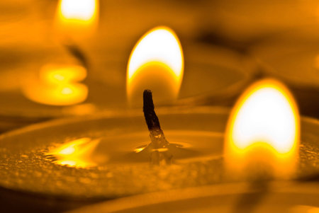 Closeup of group of burned candles