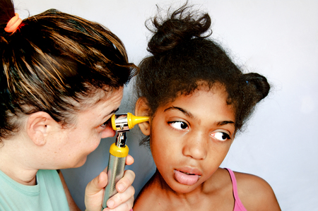 children cared for by doctors with loveの写真素材