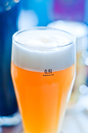 glass half-liter of fresh, refreshing, frothy beer ; at the end, enough! Give me another beer!の写真素材