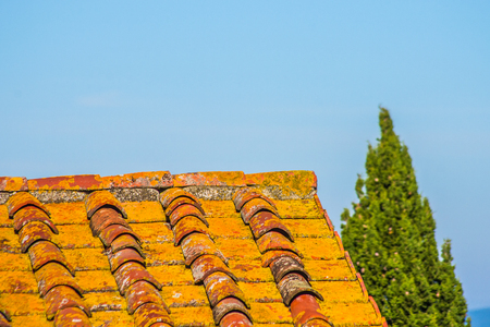 roof with aged brick roof with moss and color changeの写真素材