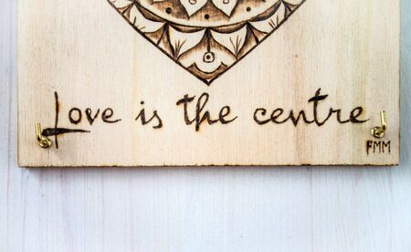 the ancient art of pyrography, wood and fire, mandala, the tranquility of life and soulの写真素材