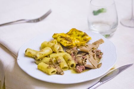 Three types of traditional Italian pasta, pasta with wild boar, pasta with meat sauce and pasta with mushroomsの写真素材