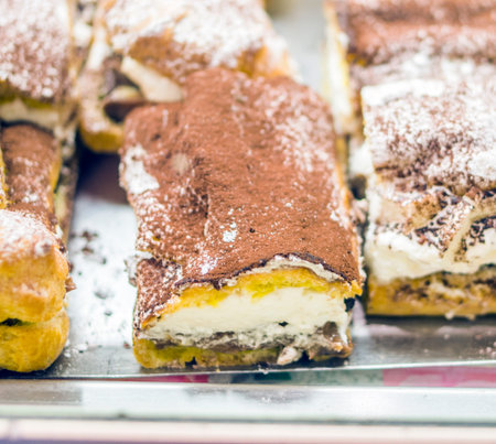 the real pastry, desserts, pastries and cakes prepared in the artisan laboratory , pastries with...