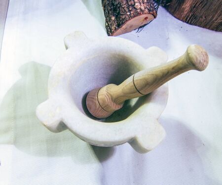 marble mortar for your kitchen to crush and crush basil, herbs, seeds, herbs and ingredients.の写真素材